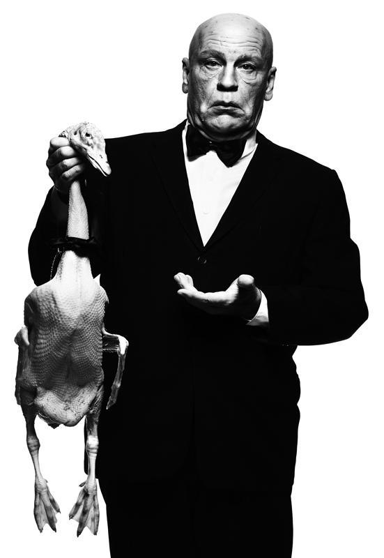 John Malkovich as Alfred Hitchcock