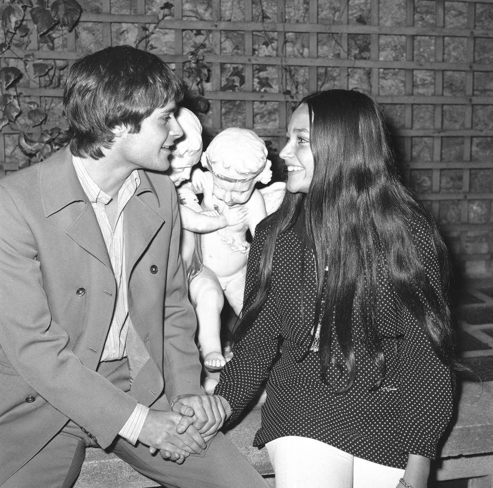 FILE - Olivia Hussey and Leonard Whiting speak in a Paris hotel on Sept. 19, 1968, about the British film "Romeo and Juliet". The two stars of 1968's “Romeo and Juliet” sued Paramount Pictures for more than $500 million on Tuesday, Jan. 3, 2023, over a nude scene in the film shot when they were teens. (AP Photo/Jean-Jacques Levy, File)