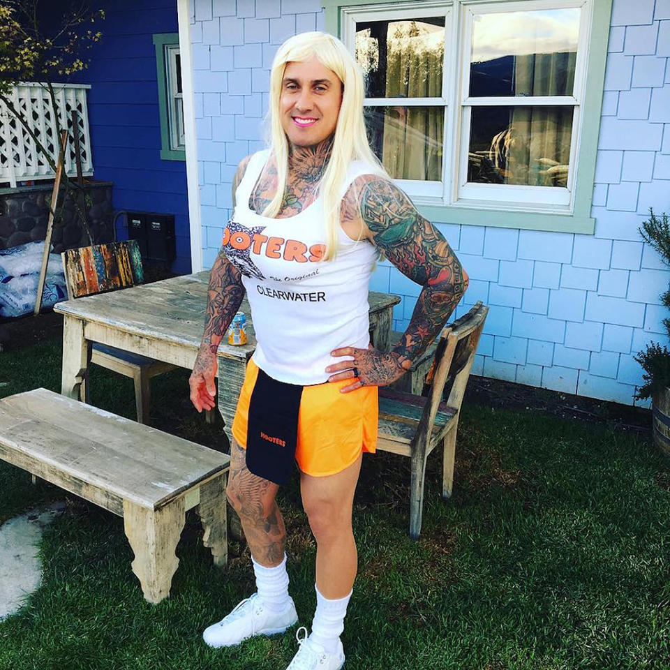 <p>Pink shared this hilarious snap of her hubby strutting his stuff as a Hooters waitress. (Photo: <a rel="nofollow noopener" href="https://www.instagram.com/p/BMIFn44lOey/?taken-by=pink" target="_blank" data-ylk="slk:Instagram;elm:context_link;itc:0;sec:content-canvas" class="link ">Instagram</a>) </p>