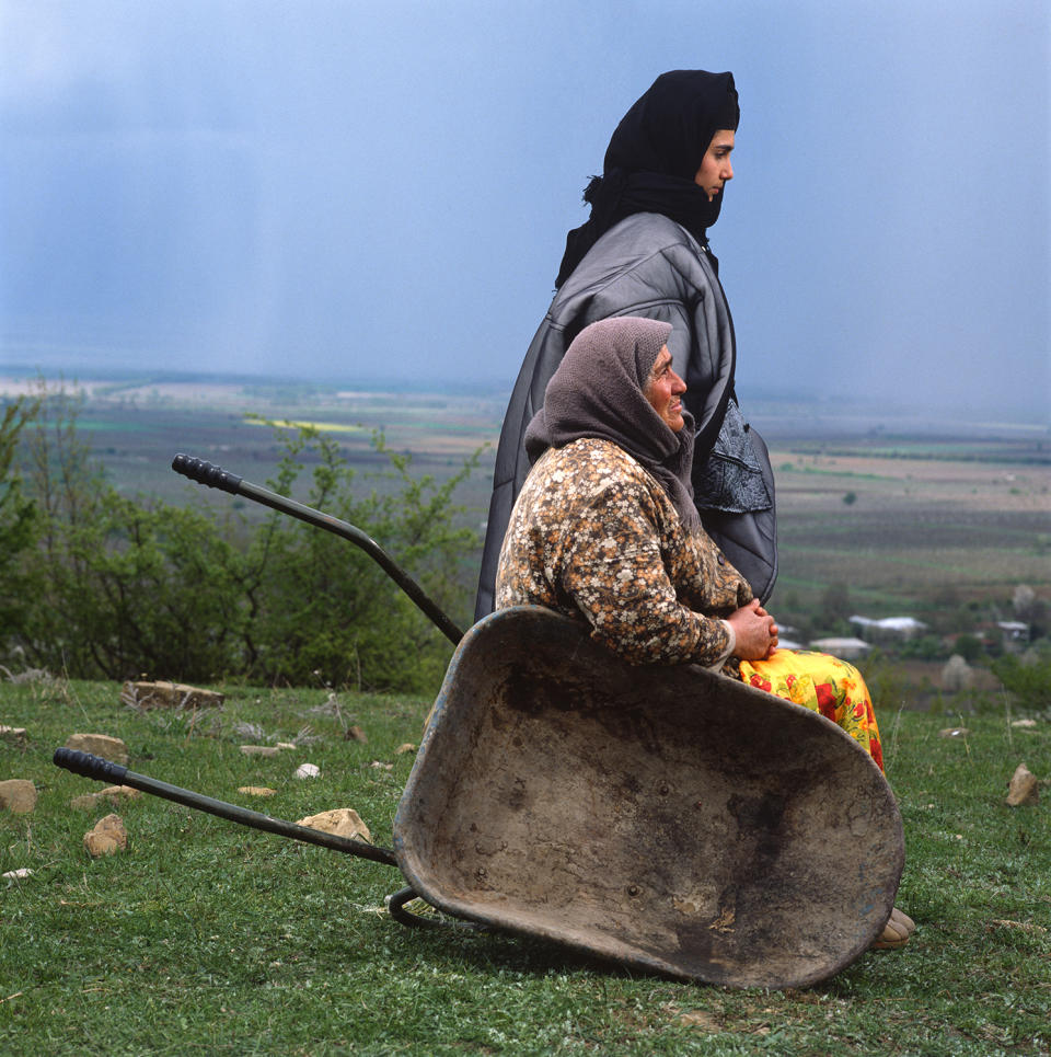 “Girl and Mother Wheelbarrow”