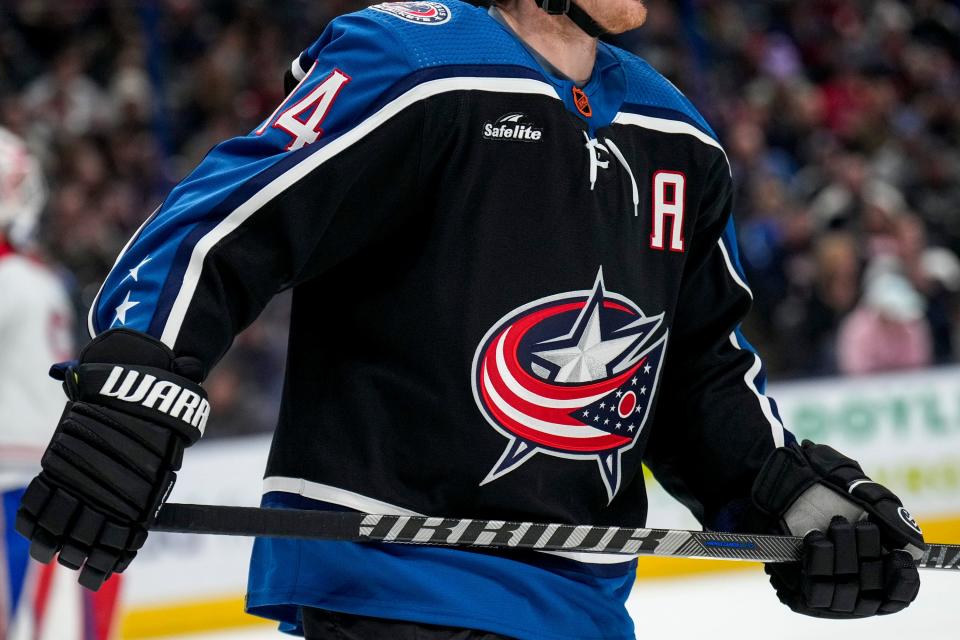 Nov 23, 2022; Columbus, Ohio, United States;  Columbus Blue Jackets forward Gustav Nyquist (14) skates down the rink wearing the Columbus Blue Jackets Reverse Retro Jersey during the first period of the NHL hockey game between the Columbus Blue Jackets and the Montreal Canadiens at Nationwide Arena. Mandatory Credit: Joseph Scheller-The Columbus Dispatch