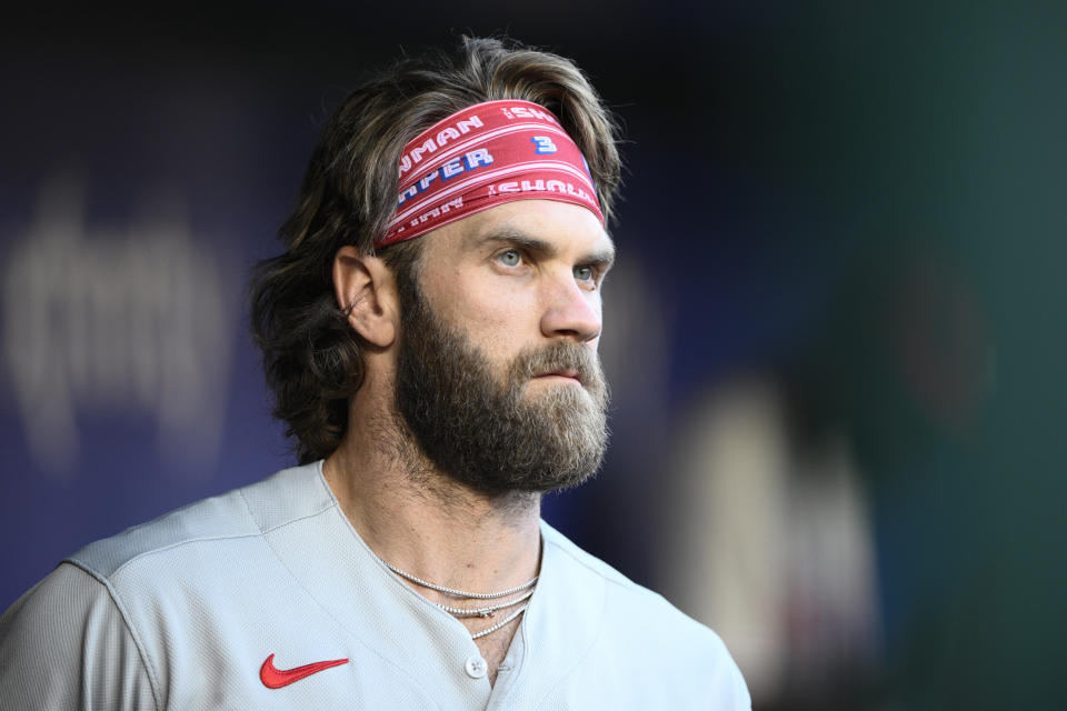 Philadelphia Phillies' Bryce Harper looks on before a baseball game against the Washington Nationals, Friday, Aug. 18, 2023, in Washington. (AP Photo/Nick Wass)