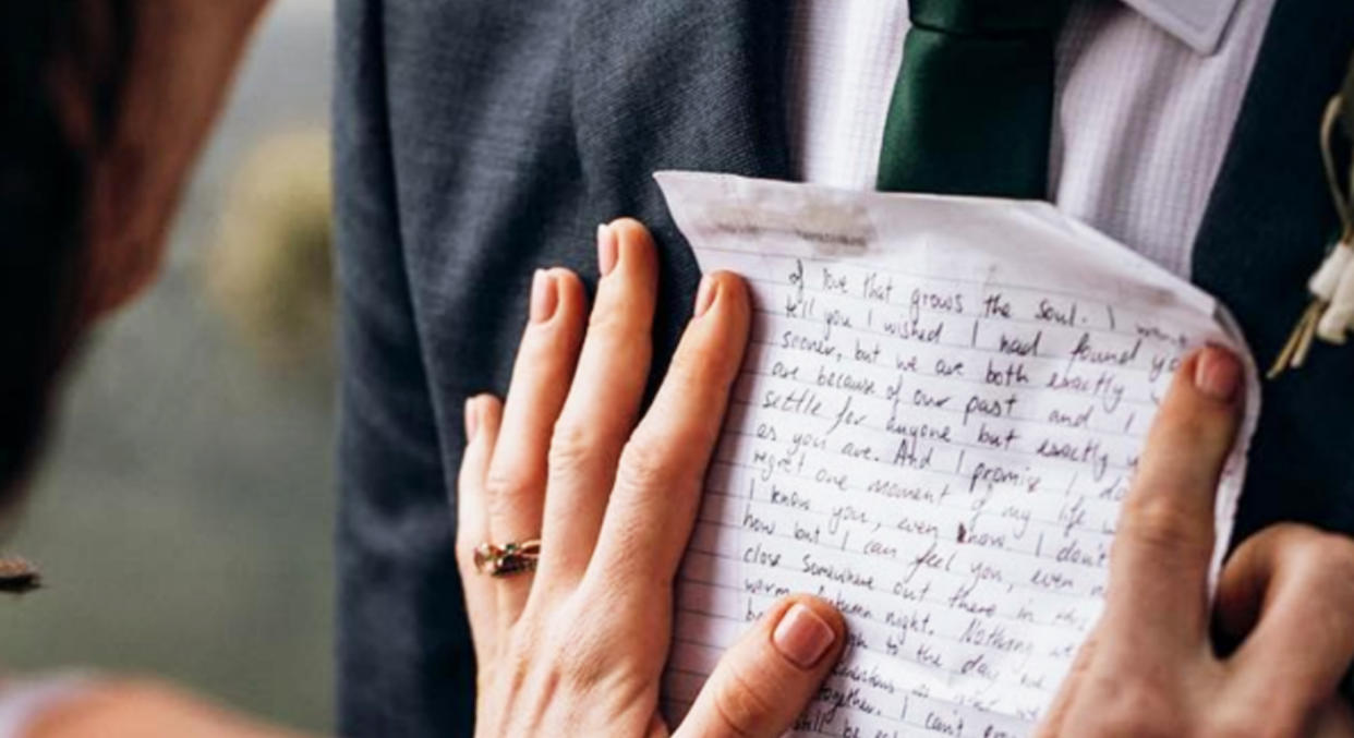 A bride read her husband a letter on their wedding day that she had written to him before they ever met. (Photo: Instagram via Lemon Tree Film House)