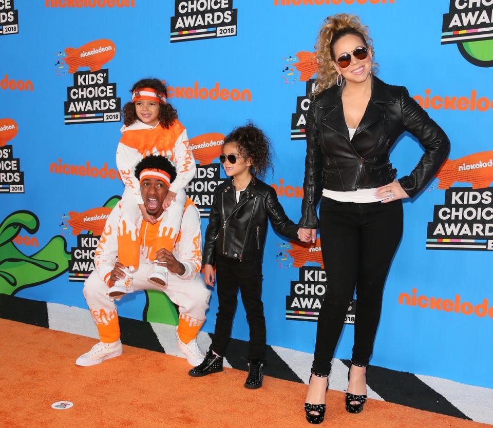 Mariah Carey and Nick Cannon with Moroccan Scott Cannon and Monroe Cannon at the 31st Annual Nickelodeon Kids' Choice Awards in 2018 (AFP via Getty Images)