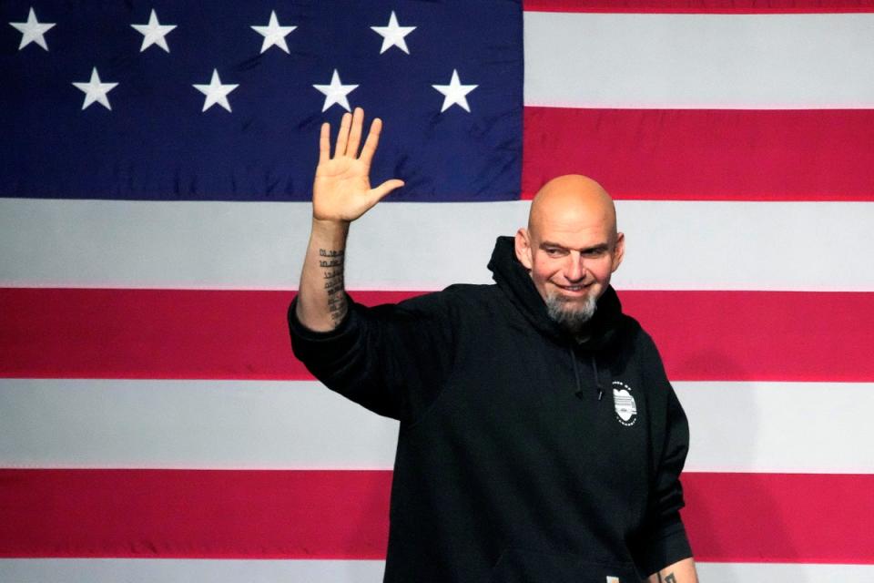 John Fetterman takes the stage at an election night party in Pittsburgh in November 2022 (Associated Press)