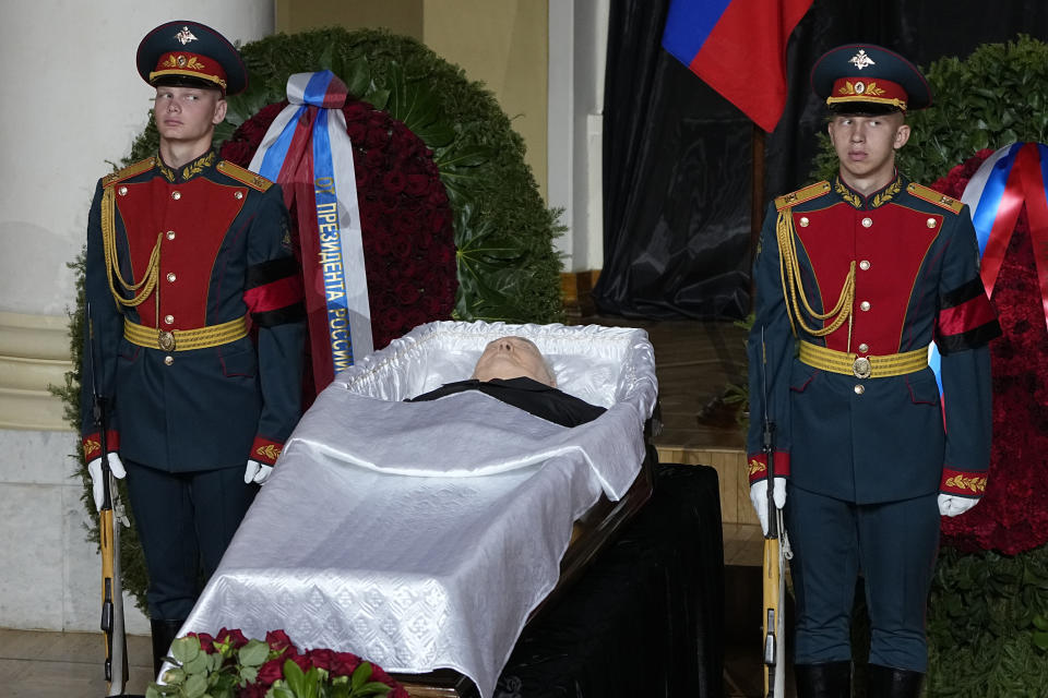 Honour guards stand by the coffin of former Soviet President Mikhail Gorbachev inside the Pillar Hall of the House of the Unions during a farewell ceremony in Moscow, Russia, Saturday, Sept. 3, 2022. Gorbachev, who died Tuesday at the age of 91, will be buried at Moscow's Novodevichy cemetery next to his wife, Raisa, following a farewell ceremony at the Pillar Hall of the House of the Unions, an iconic mansion near the Kremlin that has served as the venue for state funerals since Soviet times. (AP Photo/Alexander Zemlianichenko)