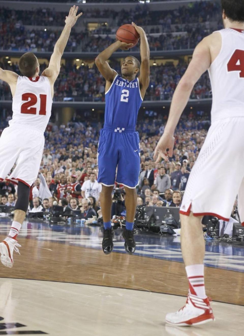 Aaron Harrison made a deep 3-pointer with seconds to play to send Kentucky past Wisconsin and into the 2014 national title game.