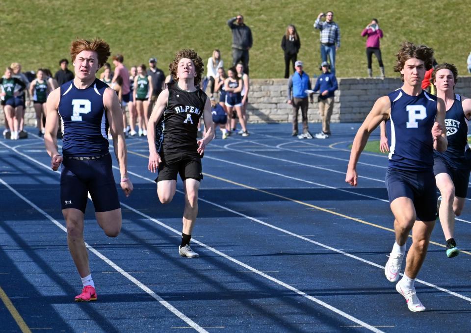 Petoskey's Seth Marek (left) and Mitch Eberhart (right) push themselves during the 100 meter dash in Wednesday's meet at Northmen Stadium.