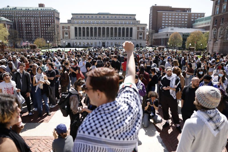 Pro-Palestinian demonstrators speak in the main quad at Columbia University in New York on Monday. Columbia University announced that classes would be held remotely starting Monday, as pro-Palestinian protests continued for the sixth day on the school's campus. .Photo by John Angelillo/UPI