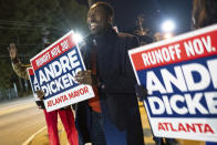 Atlanta mayoral runoff candidate Andre Dickens celebrates with supporters just before the close of polls Tuesday, Nov. 30, 2021, in Atlanta. Dickens, a city council member, won the runoff, riding a surge of support that powered him past the council’s current president, Felicia Moore, after finishing second to her in November. (AP Photo/Ben Gray)