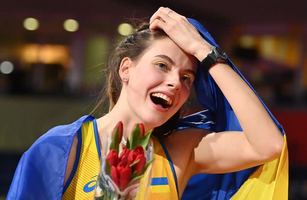 Ukraine's Yaroslava Mahuchikh celebrates after victory in the women's high jump final during The World Athletics Indoor Championships 2022 at the Stark Arena in Belgrade. (Photo: ANDREJ ISAKOVIC via Getty Images)