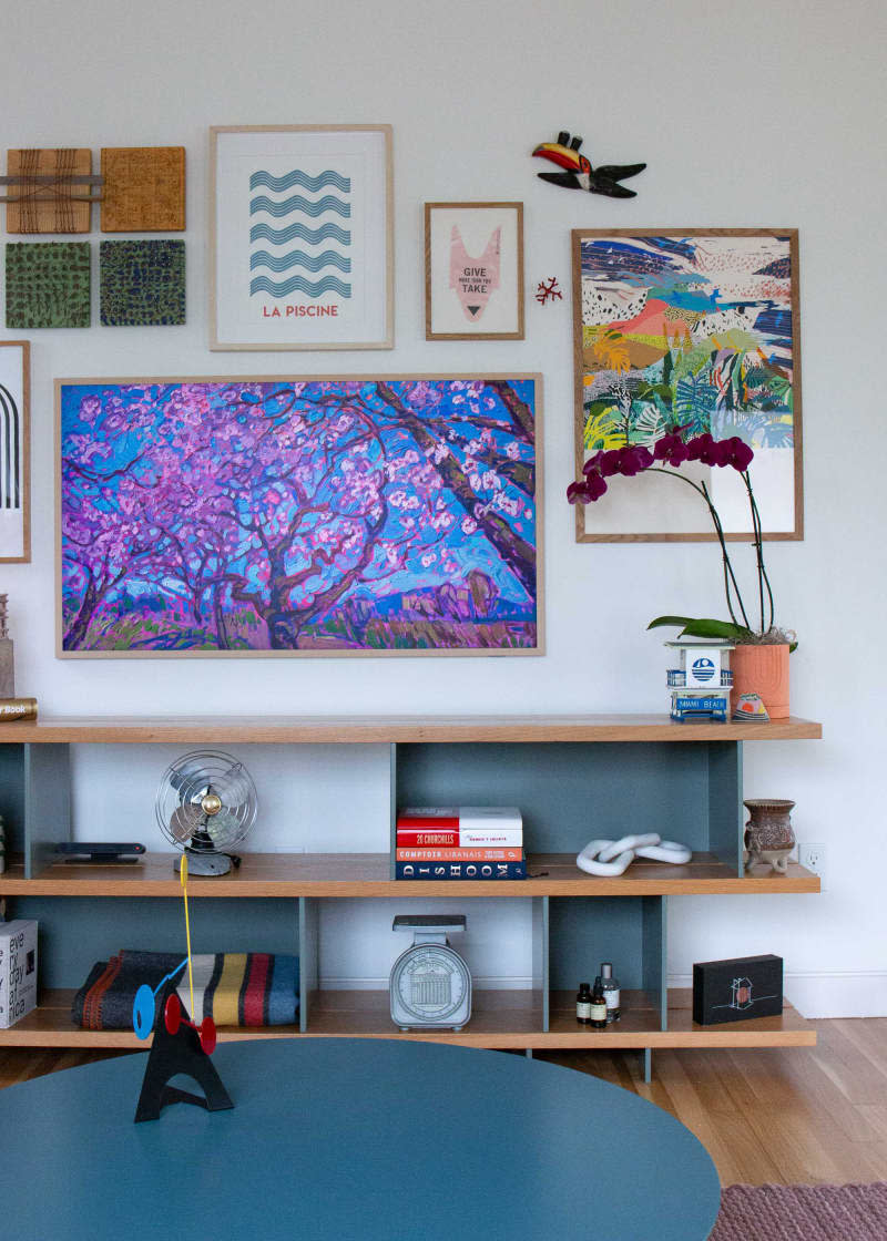 Decorated shelving in living room.