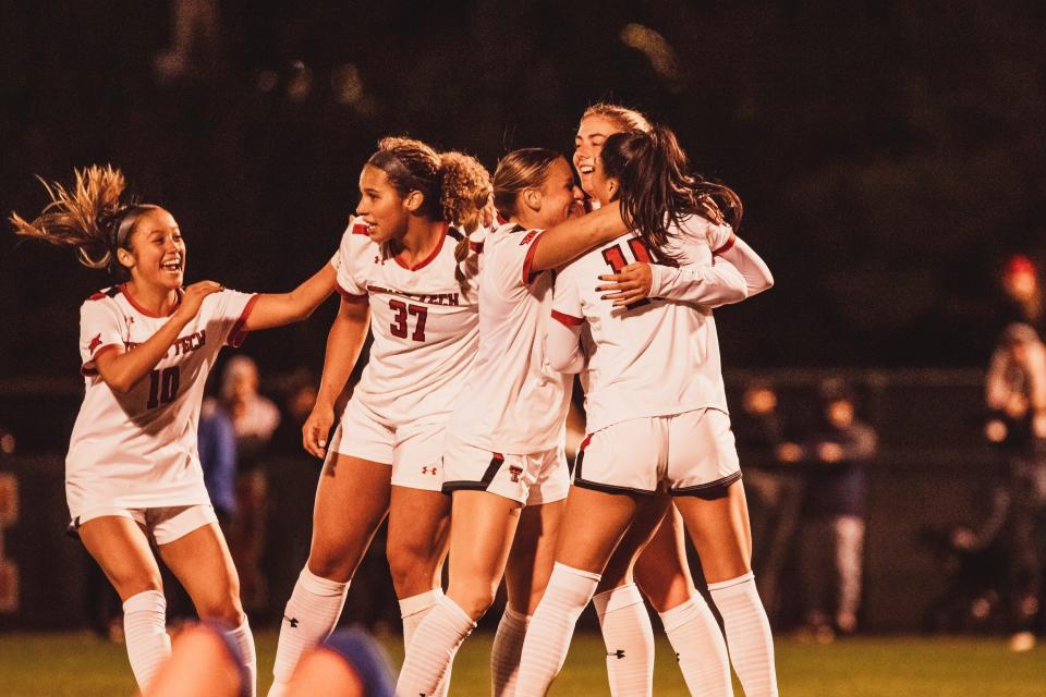 Alex Kerr celebrates her game-winning goal with teammates in Texas Tech's 1-0 win over Florida Gulf Coast, Friday, Nov. 10, 2023, in the first round of the NCAA women's soccer tournament at John Walker Soccer Complex.