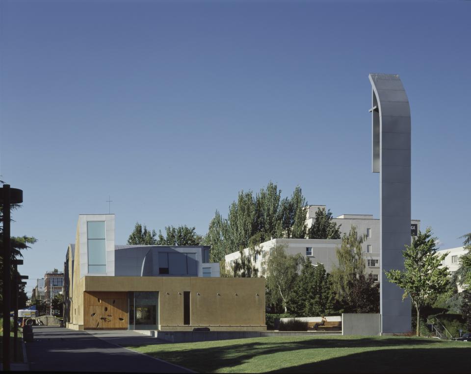 Seattle University’s Chapel of St. Ignatius (Washington)
At first glance, one might mistake Chapel of St. Ignatius for a contemporary-art museum, but no, it’s a place of worship, designed by Steven Holl in 1997. Interior pendant lighting (with exposed bulbs) and white concaved ceilings create an intimate, softer feeling than the modernized exterior.