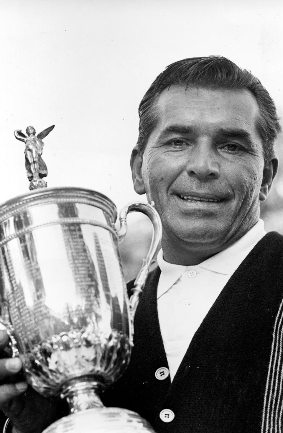 FILE - Julius Boros poses with the trophy at the Country Club in Brookline, Mass., on June 24, 1963, after winning the U.S. Open Golf Championship. The U.S. Open returns to The Country Club in June 2022. (AP Photo/File)
