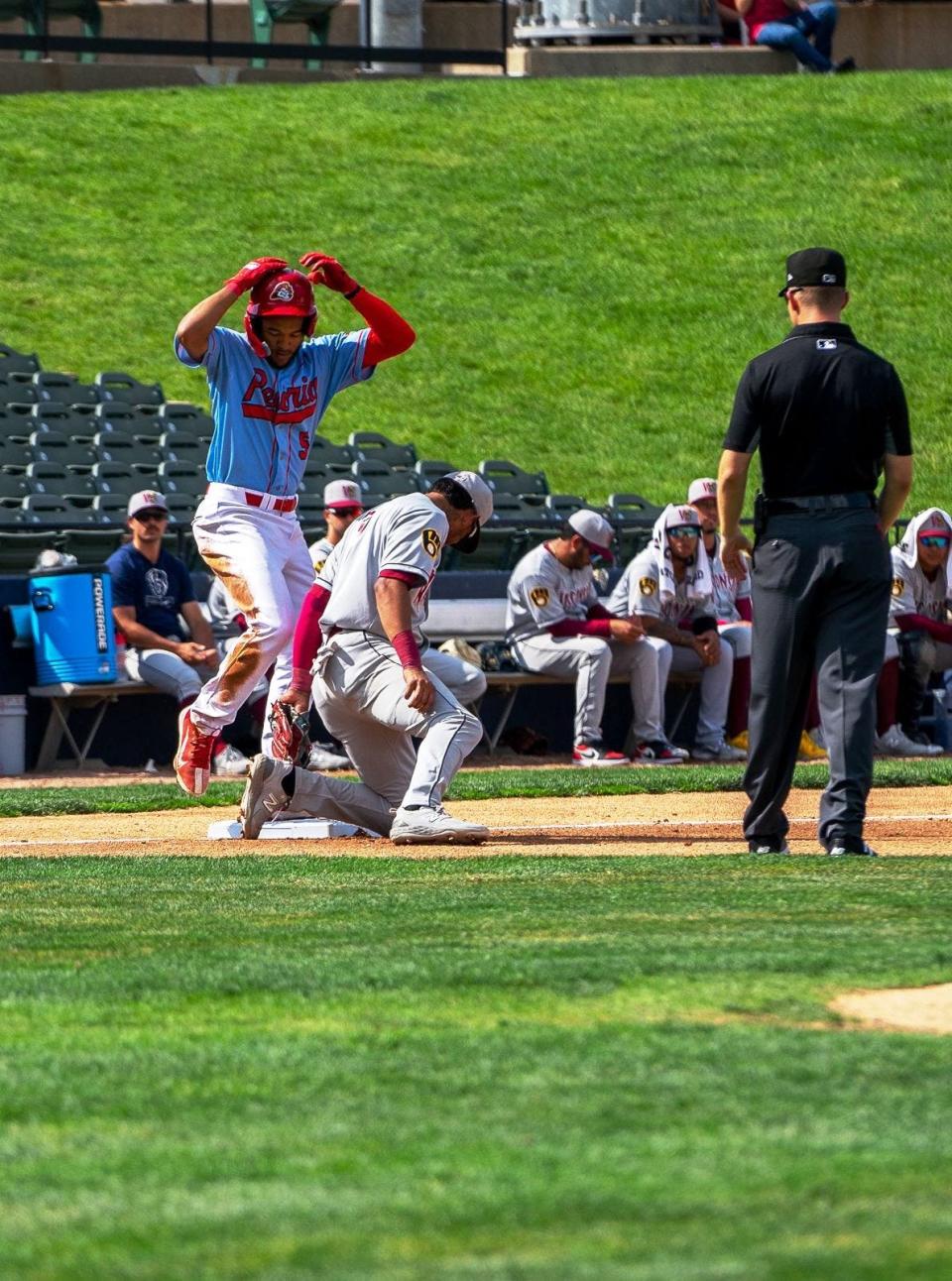 Peoria Chiefs outfielder and St. Louis Cardinals prospect Victor Scott II steals third base in a Midwest League game at Dozer Park in June, 2023.