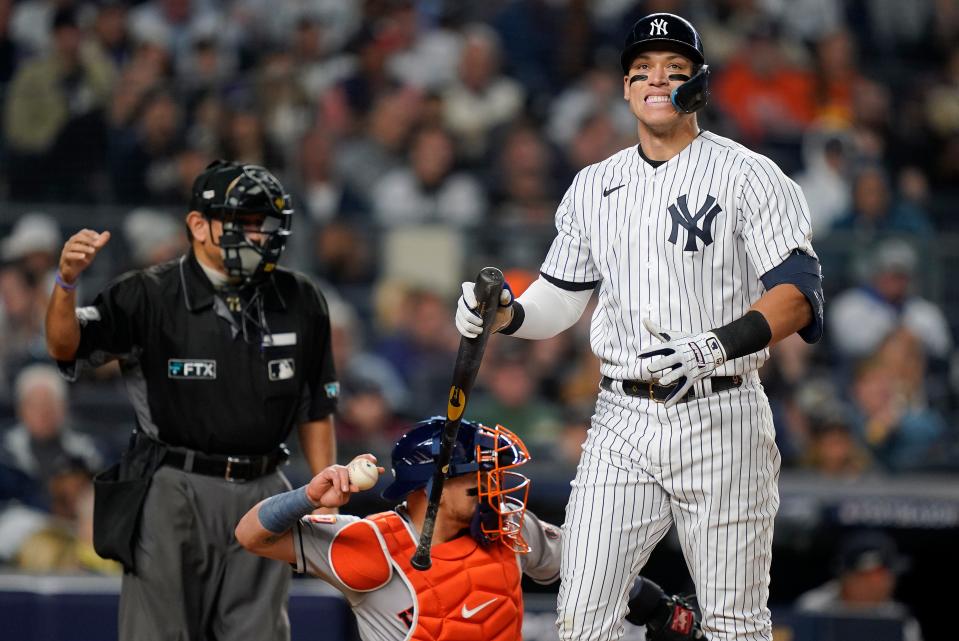 New York Yankees Aaron Judge reacts after striking out against the Houston Astros during the fourth inning of Game 3 of an American League Championship baseball series, Saturday, Oct. 22, 2022, in New York. (AP Photo/John Minchillo)