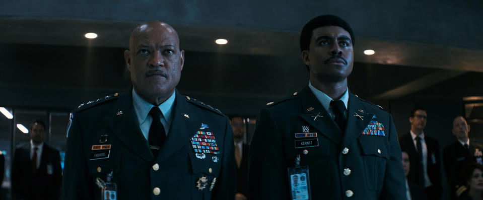 MACGRUBER — Pictured in this screengrab: Laurence Fishburne as Gen. Barrett Fasoose, Joseph Lee Anderson as Major Harold Kernst — (Photo by: Peacock) - Credit: Peacock