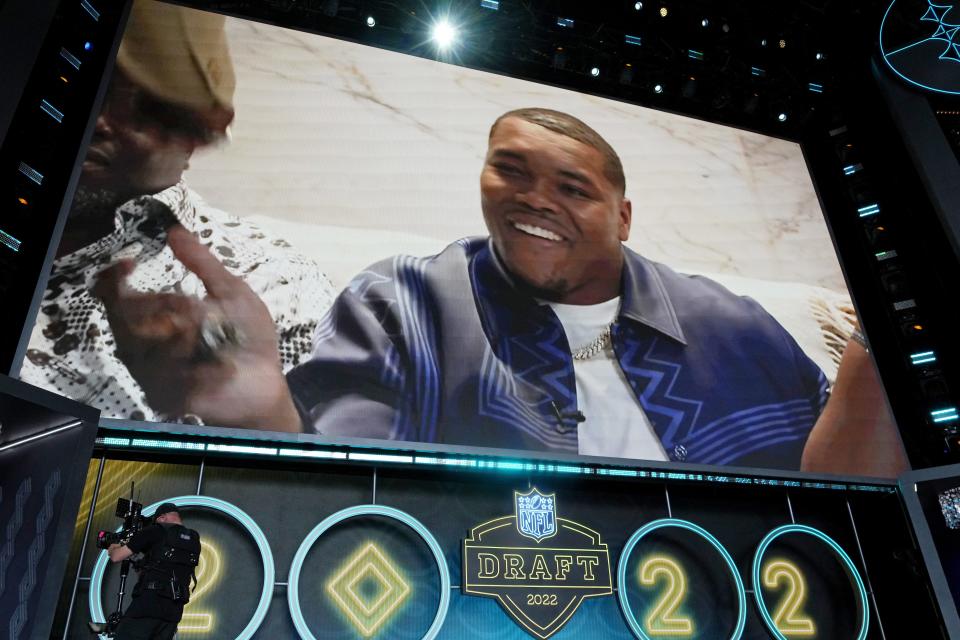 Apr 28, 2022; Las Vegas, NV, USA; Georgia defensive end Travon Walker reacts after being selected as the first overall pick to the to the Jacksonville Jaguars during the first round of the 2022 NFL Draft at the NFL Draft Theater.  [Kirby Lee-USA TODAY Sports]