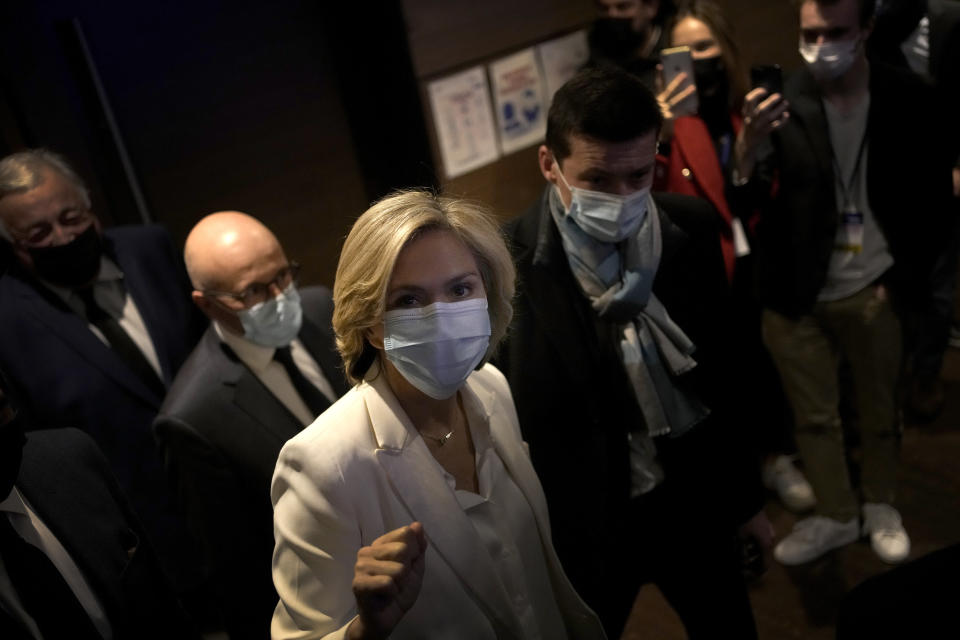 Valerie Pecresse, candidate for the French presidential election 2022, arrives to deliver a speech during a meeting in Paris, France, Saturday, Dec. 11, 2021. The first round of the 2022 French presidential election will be held on April 10, 2022 and the second round on April 24, 2022. (AP Photo/Christophe Ena)