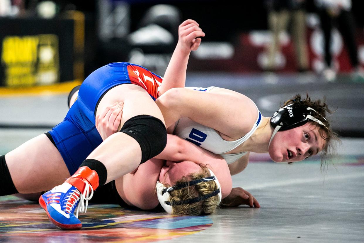 Decorah's Naomi Simon pinned Southeast Polk's Bella Porcelli in the state finals in January. Both Simon and Porcelli earned All-American status at the 16U women's freestyle national championships this week.