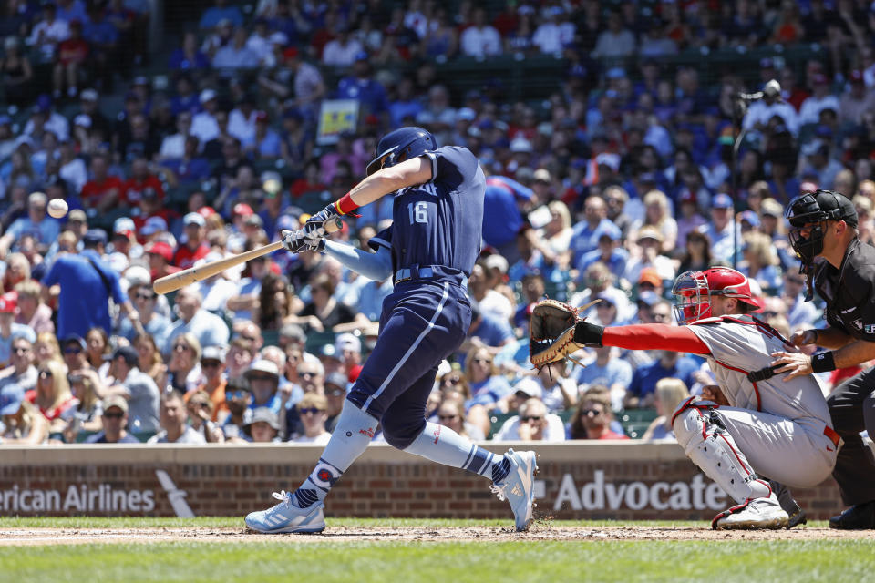 Chicago Cubs' Patrick Wisdom hits a three-run home run against the St. Louis Cardinals during the first inning of a baseball game, Friday, June 3, 2022, in Chicago. (AP Photo/Kamil Krzaczynski)