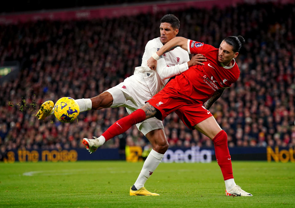 Liverpool's Darwin Nunez (right) and Manchester United's Raphael Varane battle for the ball during their English Premier League clash at Anfield. 