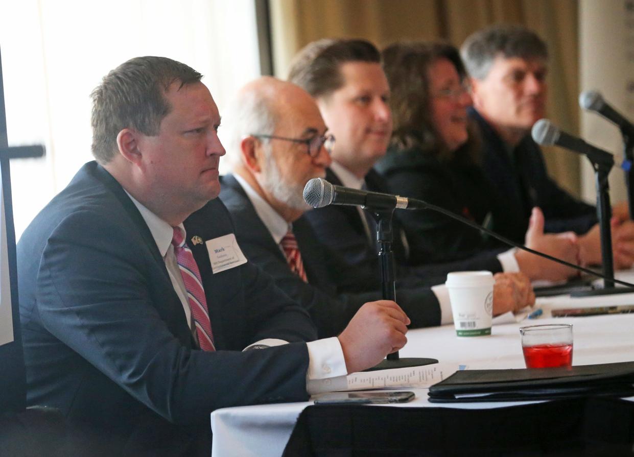 Mark Sanborn, New Hamphire Department of Environmental Services assistant commissioner, left, is introduced during the New Hampshire Offshore Wind Summit Tuesday, Sept. 27 in Portsmouth. Other members seen here are state Sen. David Watters, Chris Ellms of the Depatment of Engergy, Cheri Patterson of New Hampshire Fish & Game and Erik Chapman of New Hampshire Sea Grant .