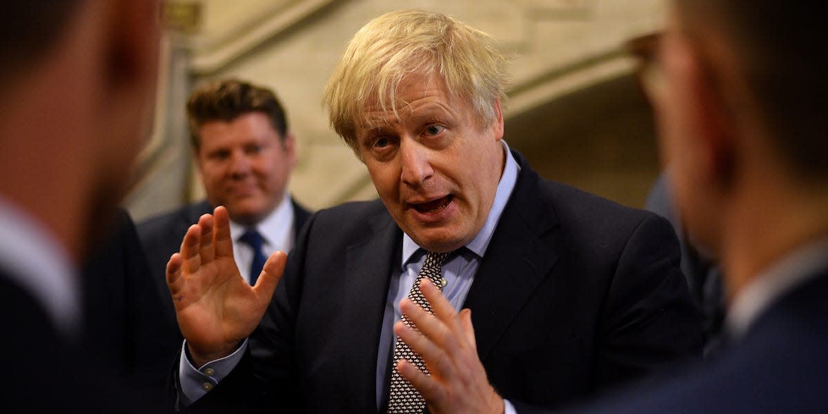 British Prime Minister Boris Johnson talks with newly-elected Conservative MPs at the Houses of Parliament, London, Britain December 16, 2019. Leon Neal/Pool via REUTERS