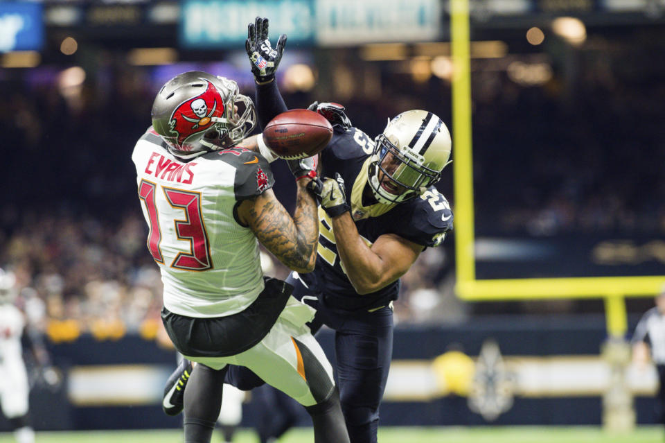 Mike Evans is going to sit out a game for his hit on New Orleans’ Marshon Lattimore. (AP)