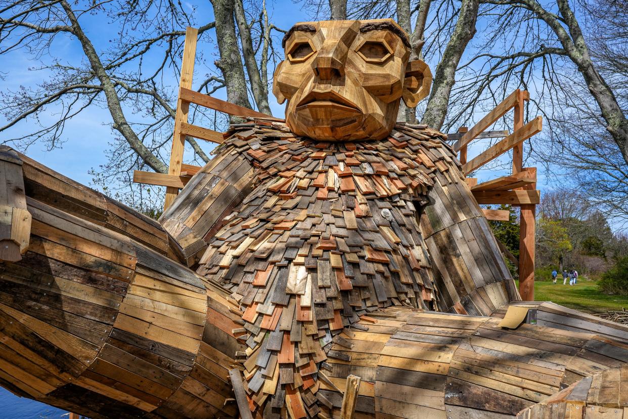 One of two wooden troll statues by Danish artist Thomas Dambo nears completion at Ninigret Park in Charlestown. The public art installation will officially open on Friday.