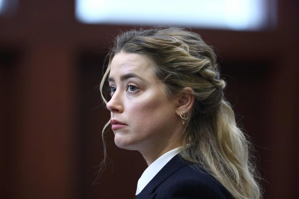 Actress Amber Heard attends the defamation trial against her at the Fairfax County Circuit Courthouse in Fairfax, Virginia, April 21, 2022.