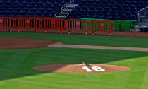 <p>The Miami Marlins place the number 16 on the back of the pitchers mound in a memorial for starting pitcher Jose Fernandez who was killed in a boating accident, Sept. 25, 2016. The game between the Atlanta Braves and Marlins was cancelled. (Photo: Robert Mayer-USA TODAY Sports/Reuters)</p>