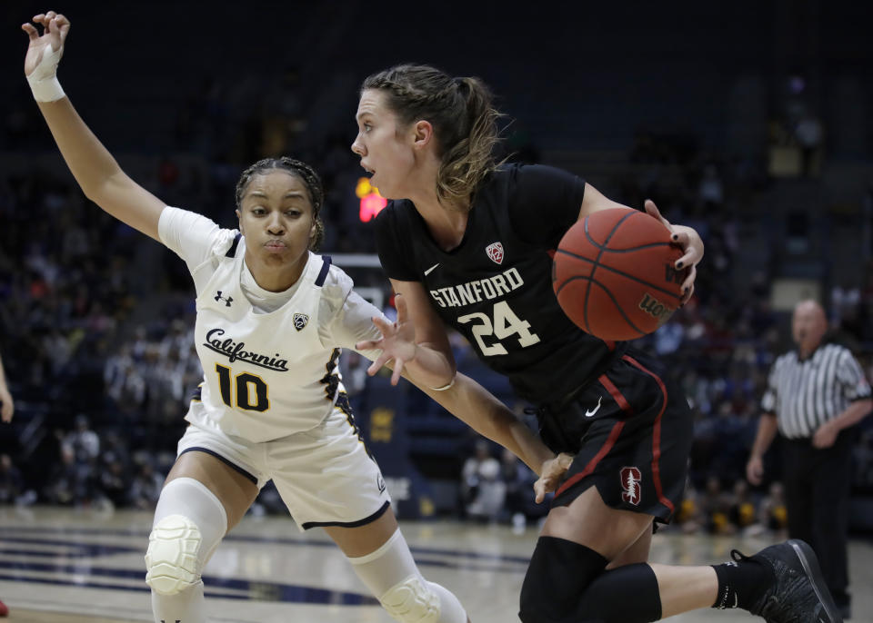 Stanford's Lacie Hull, right, drives the ball against California's Jazlen Green (10) in the first half of an NCAA college basketball game Sunday, Jan. 12, 2020, in Berkeley, Calif. (AP Photo/Ben Margot)