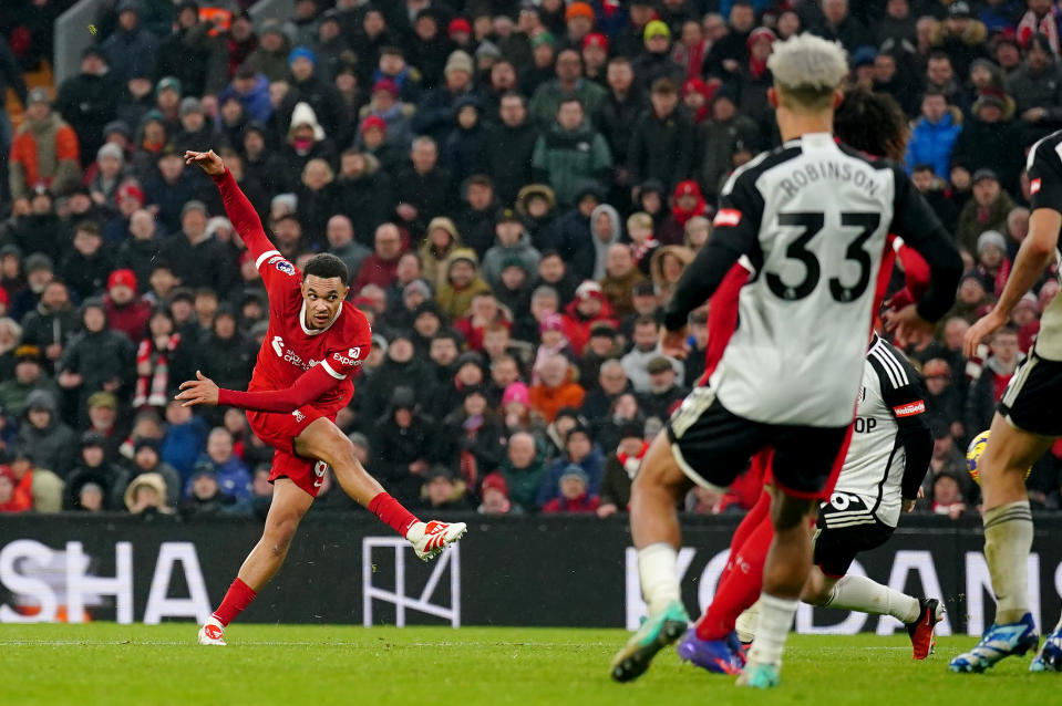 Liverpool's Trent Alexander-Arnold (left) scores their fourth goal during the English Premier League match against Fulham. 