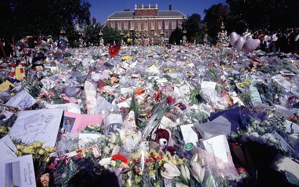 The floral tributes to Diana, Princess of Wales outside Kensington Palace in 1997   - Getty