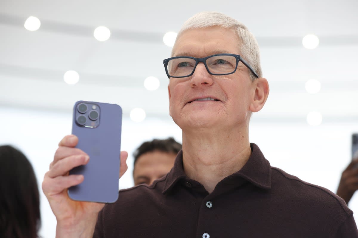 Apple, led by boss Tim Cook, is understood to be curbing the number of iPhones it aims to produce for the rest of the year, knocking its shares.  (Getty Images)