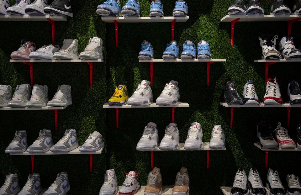 A shoe rack inside the Retail Boyz sneaker store is photographed at the Northridge Mall in Salinas, Calif., on Monday Nov. 22, 2021. 