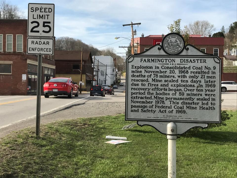 A sign along Main Street in Farmington, W.Va., memorializes the explosion in 1968 that  was one of the worst coal mine disasters in U.S. history.