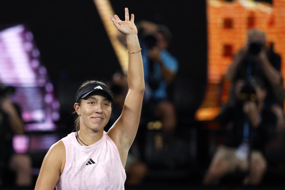 Jessica Pegula of the U.S. waves after defeating Aliaksandra Sasnovich of Belarus in their second round match at the Australian Open tennis championship in Melbourne, Australia, Wednesday, Jan. 18, 2023. (AP Photo/Asanka Brendon Ratnayake)