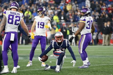 New England Patriots cornerback Jonathan Jones (31) reacts after an interception during the fourth quarter against the Minnesota Vikings at Gillette Stadium - Credit: Greg M. Cooper/USA TODAY