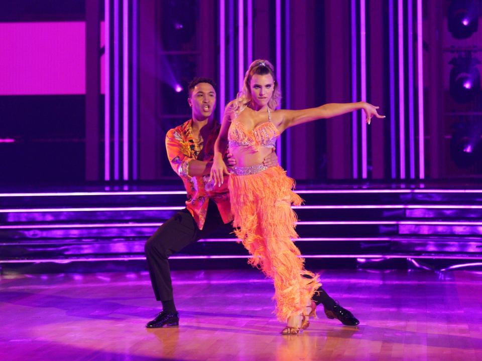 Brandon Armstrong and Lele Pons dancing samba.