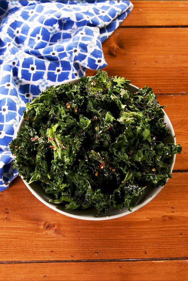 <p>Homemade kale crisps are the easiest <a href="https://www.delish.com/uk/cooking/recipes/g29893176/healthy-snack-recipes/" rel="nofollow noopener" target="_blank" data-ylk="slk:healthy snack;elm:context_link;itc:0;sec:content-canvas" class="link ">healthy snack</a> we've ever made. Toss it with any of your favourite seasonings or keep them simple with salt and pepper. </p><p>Get the <a href="http://www.delish.com/uk/cooking/recipes/a30713446/kale-chips-recipe/" rel="nofollow noopener" target="_blank" data-ylk="slk:Kale Crisps;elm:context_link;itc:0;sec:content-canvas" class="link ">Kale Crisps</a> recipe. </p>