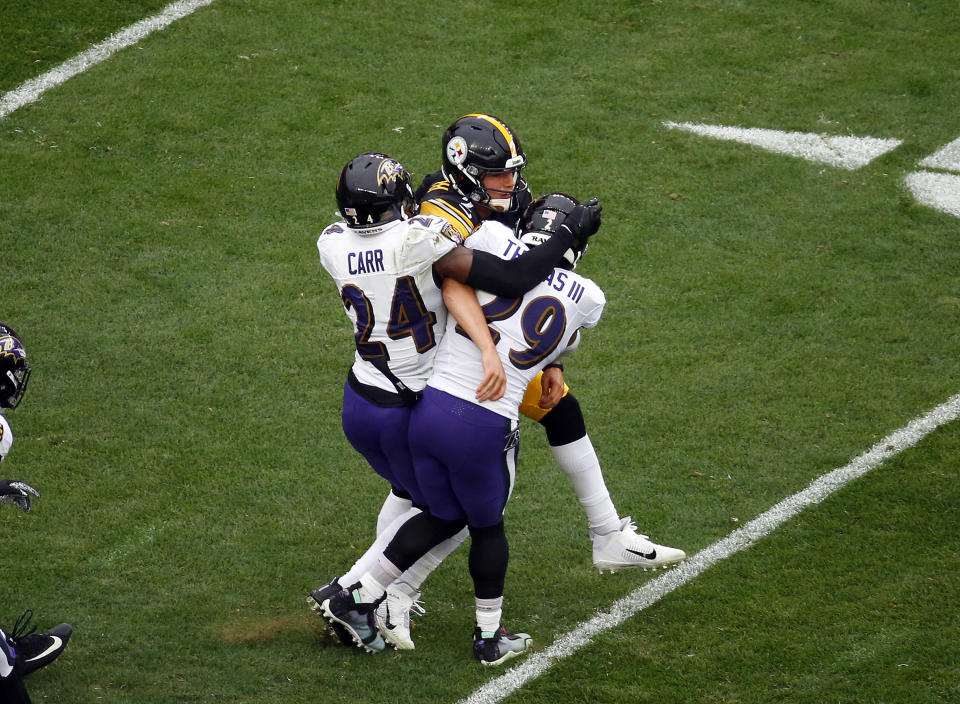 PITTSBURGH, PA - OCTOBER 06:  Mason Rudolph #2 of the Pittsburgh Steelers is injured on the play between Earl Thomas #29 and Brandon Carr #24 of the Baltimore Ravens on October 6, 2019 at Heinz Field in Pittsburgh, Pennsylvania.  (Photo by Justin K. Aller/Getty Images)