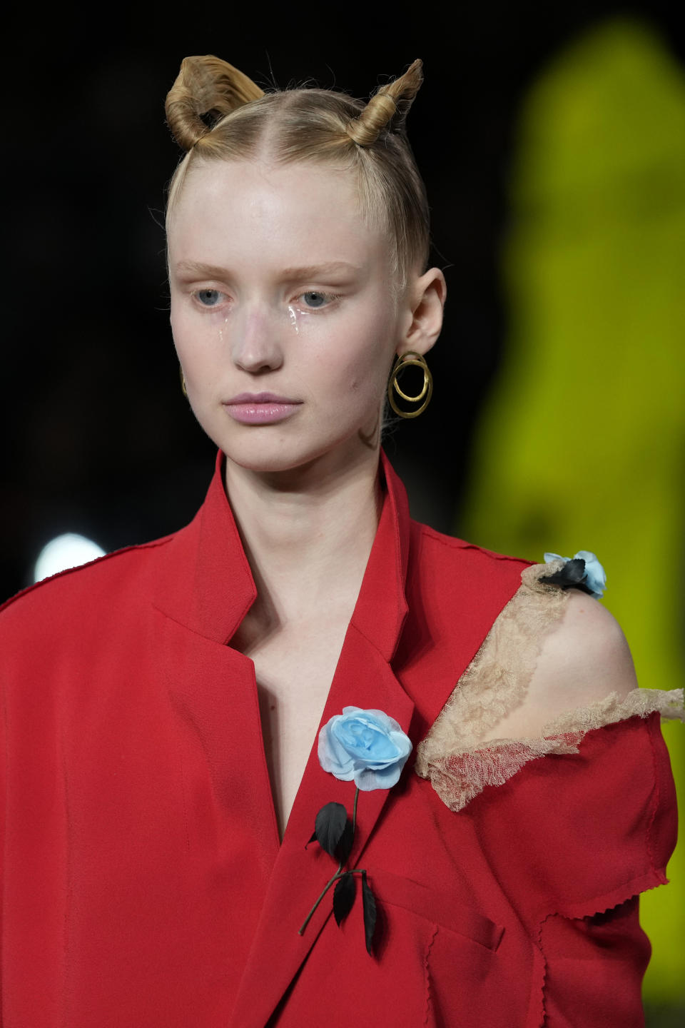 A model wears a creation for Undercover ready-to-wear Spring/Summer 2023 fashion collection presented Wednesday, Sept. 28, 2022 at the American cathedral in Paris. (AP Photo/Francois Mori)