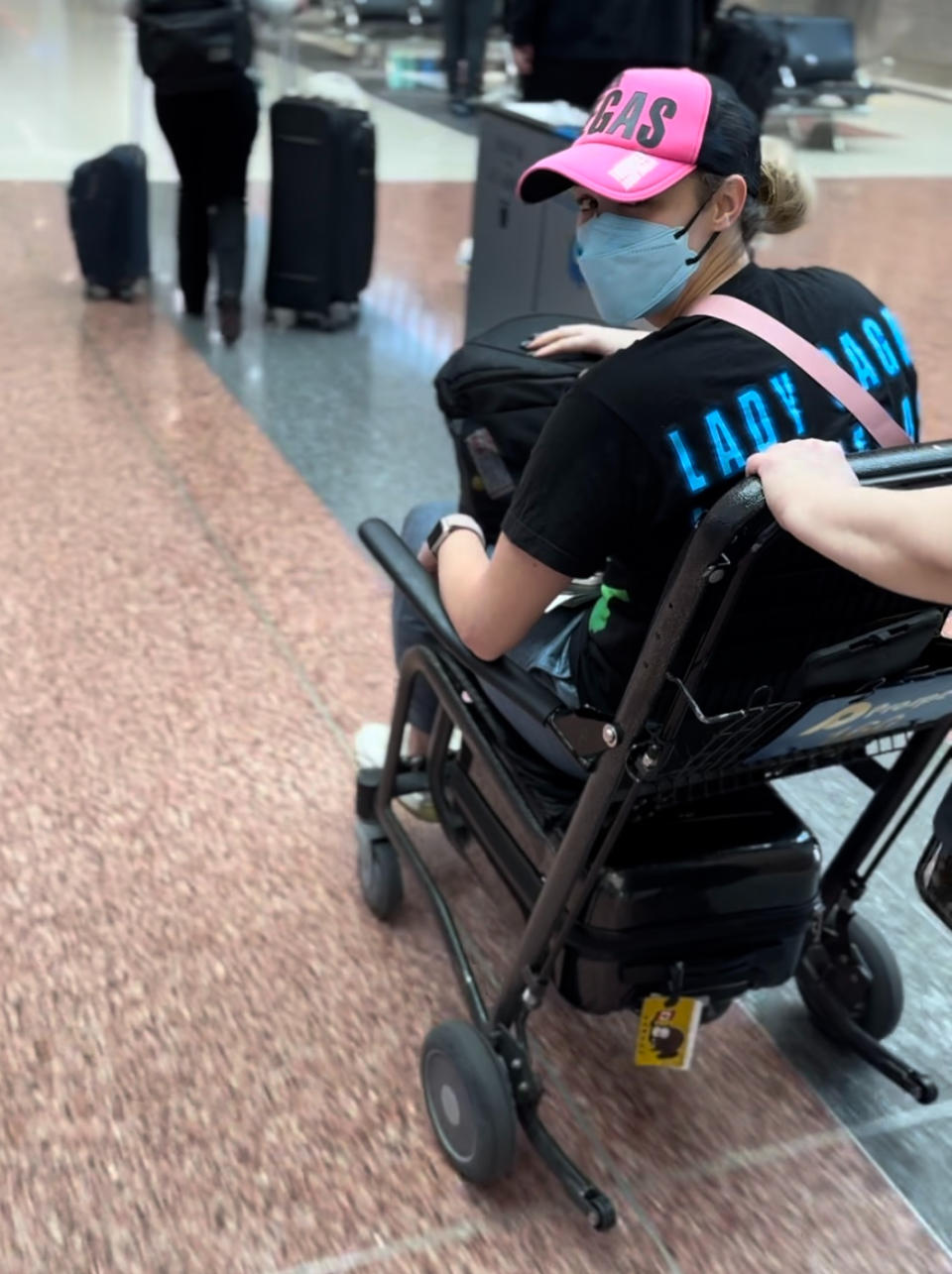 Doriana Homerski needed a wheelchair at an airport, after standing for a few minutes. Homerski wants people to know that long Covid is an invisible illness and though it may not look disabling, it is. (Image provided by Doriana Homerski)