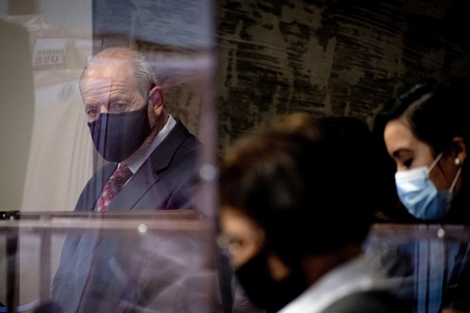 El Paso Mayor Oscar Leeser looks over his plexiglass shield on Tuesday, Aug. 24, 2021, during the first in-person City Council meeting since the beginning of the COVID-19 pandemic.