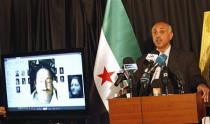 Abdeltawwab Shahrour, head of the forensic medicine committee in Aleppo, speaks during a news conference in Istanbul September 10, 2013. REUTERS/Murad Sezer