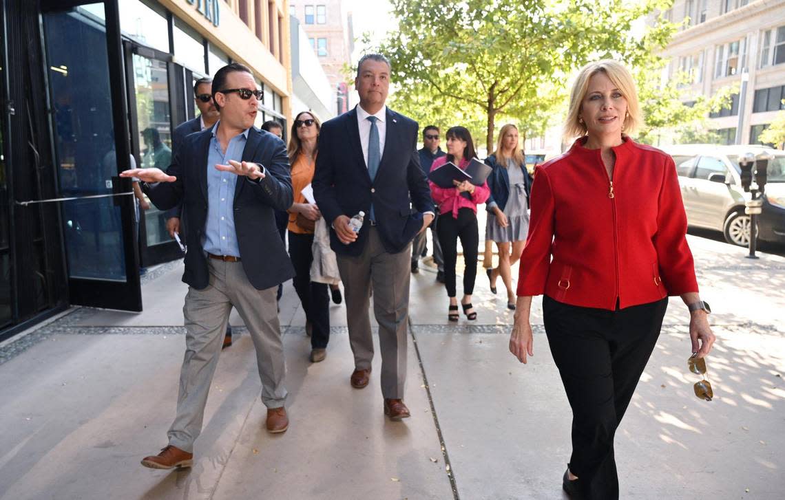 Dan Zack, President and Principal Planner for Zack Urban Solutions, Inc., left, leads a tour of downtown Fresno for U.S. Senator Alex Padilla, center, with former mayor and President and CEO of the Central Valley Community Foundation Ashley Swearengin to the right Friday morning, Oct. 14, 2022 in downtown Fresno.