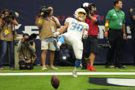 Los Angeles Chargers running back Austin Ekeler (30) after scoring a touchdown against the Houston Texans during the second half of an NFL football game Sunday, Oct. 2, 2022, in Houston. (AP Photo/David J. Phillip)